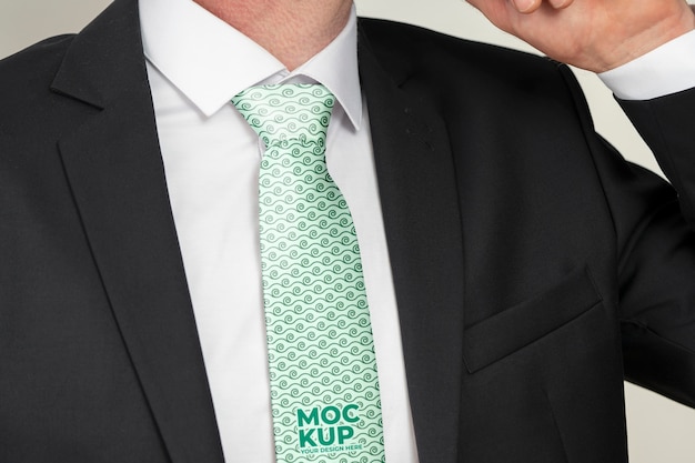 Front view elegant man wearing green tie