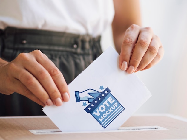 PSD front view female putting ballot mock-up in box