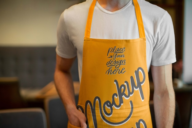 Front view man wearing apron mockup