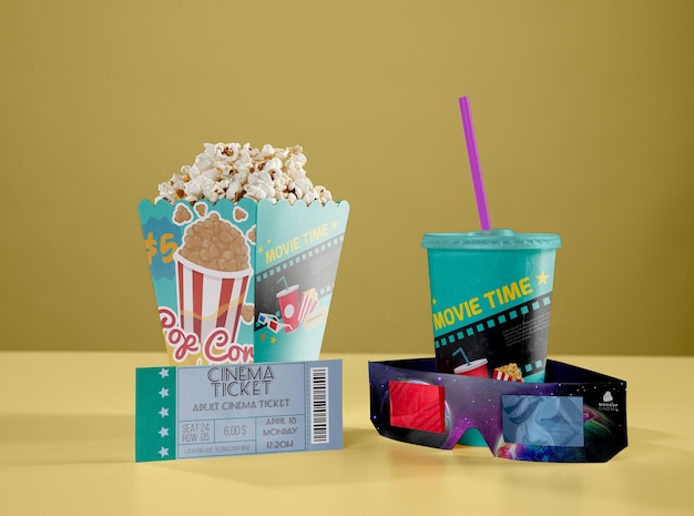 Front view of threedimensional glasses with cinema popcorn and cup