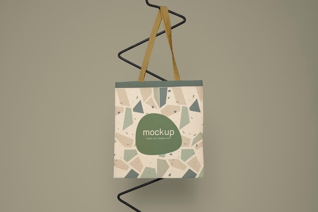 Front view tote bag design with green background