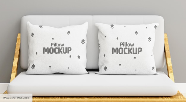 Front View of Two White Pillow Mockup on Sofa