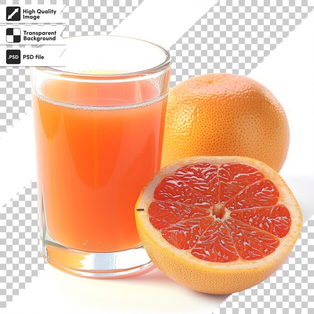 PSD a glass of juice next to a half grapefruit