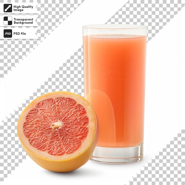 a glass of orange juice next to a half a grapefruit