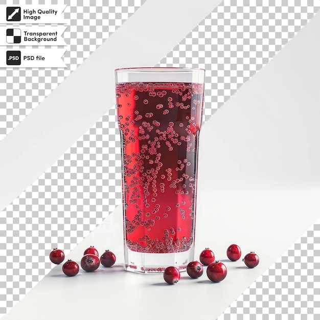 a glass of red liquid with berries on it