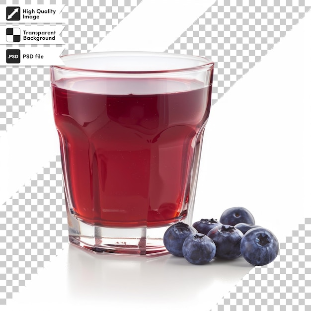 a glass of red liquid with blueberries on it