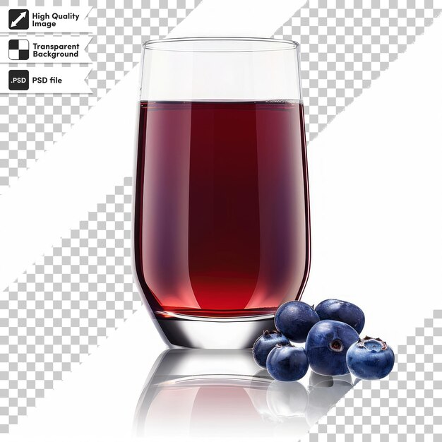 a glass of red liquid with blueberries in it