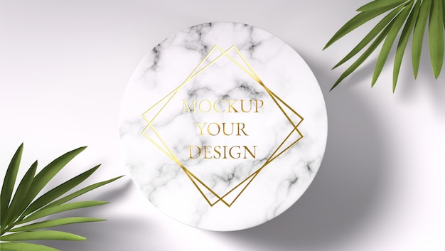 PSD gold logo mockup on circle marble with palm leaves