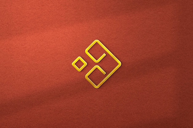 Gold Logo Mockup with Embossed Effect on Red Color Background