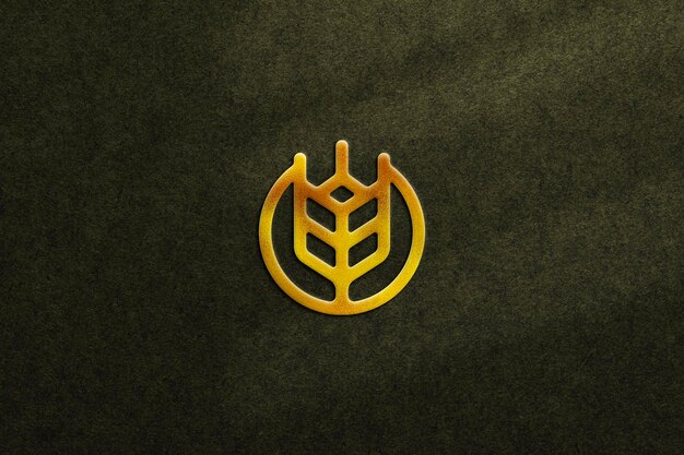 PSD gold logo mockup with embossed effect on texture background