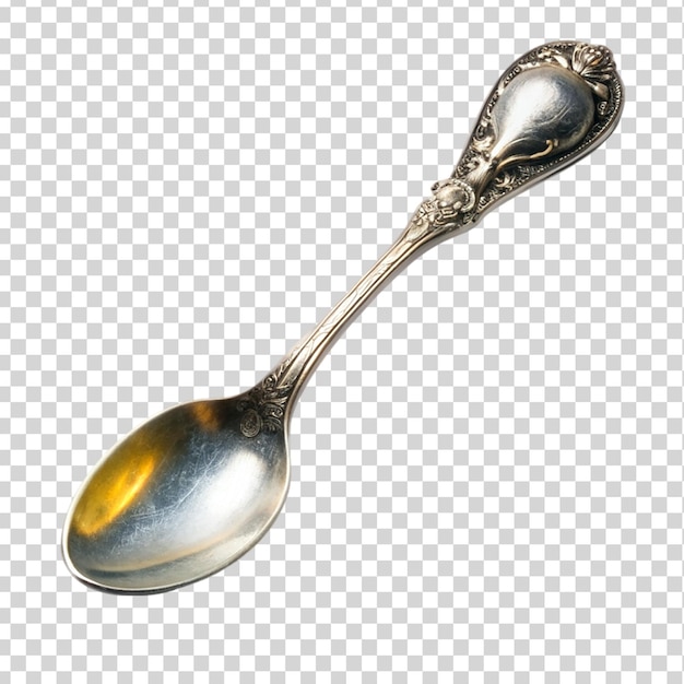 PSD a gold spoon with a decorative handle on transparent background