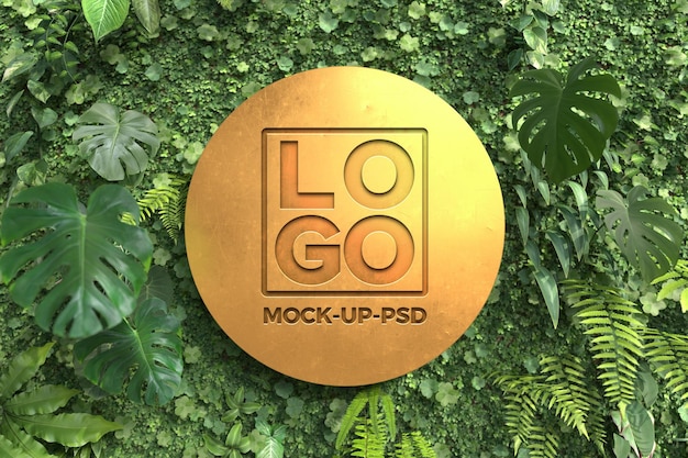 Golden sign mockup on vertical garden