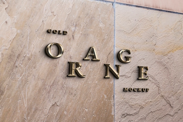 Golden text on stone logo design