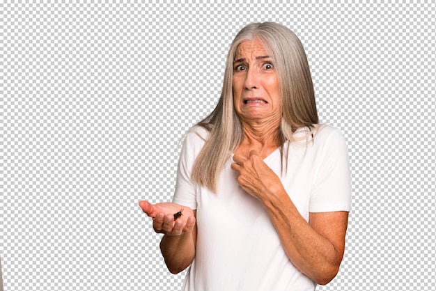 Gray hair senior pretty woman holding an insect with her fingers