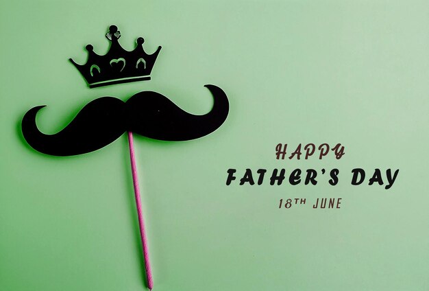 A green background with a crown and Fathers day illustration