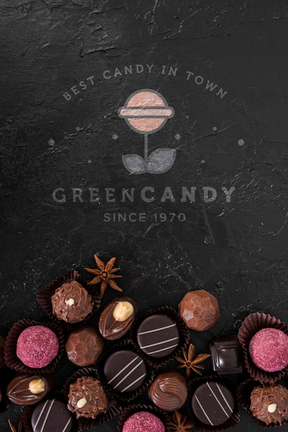 PSD green candy logo mock-up with pralines