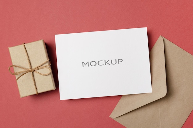 Greeting card mockup with envelope and gift box