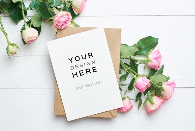 Greeting card mockup with envelope and roses flowers bouquet