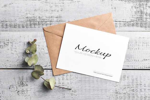 Greeting or invitation card mockup with dry eucalyptus