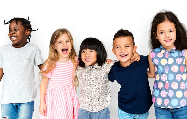 Group of cute and adorable children smiling and being happy