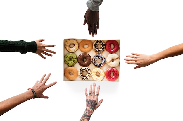 PSD group of hands reaching sweeten donut dessert