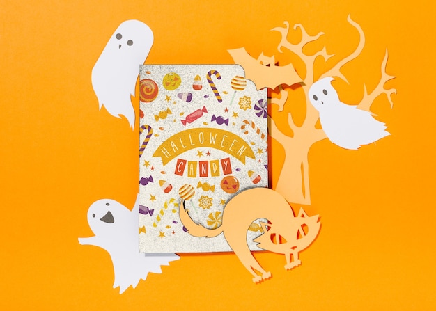 Halloween cover mockup with paper cut ghosts and cat