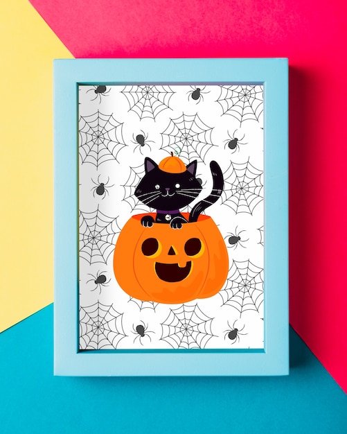 Halloween frame concept with black cat and pumpkin