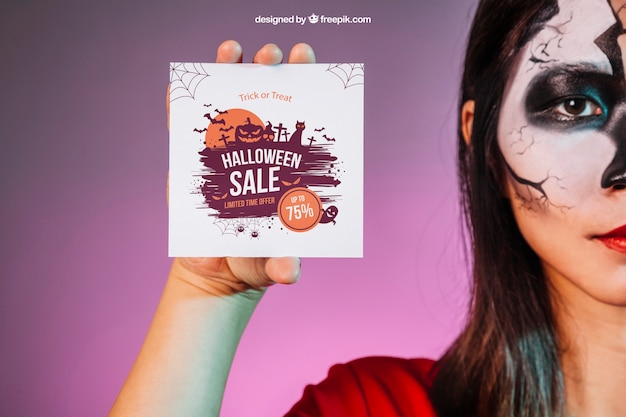 Halloween mockup with girl showing card