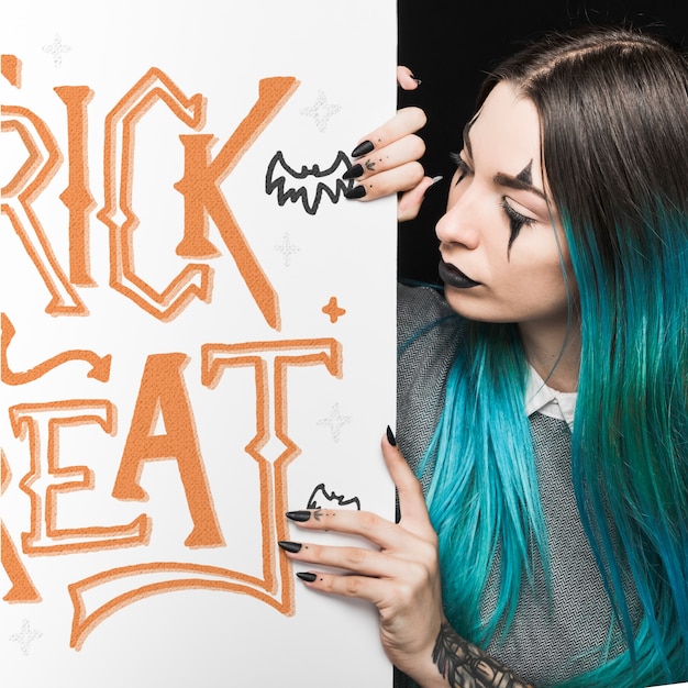 PSD halloween mockup with lettering on big board and woman