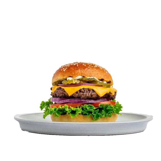 a hamburger on a plate with a green lettuce on it