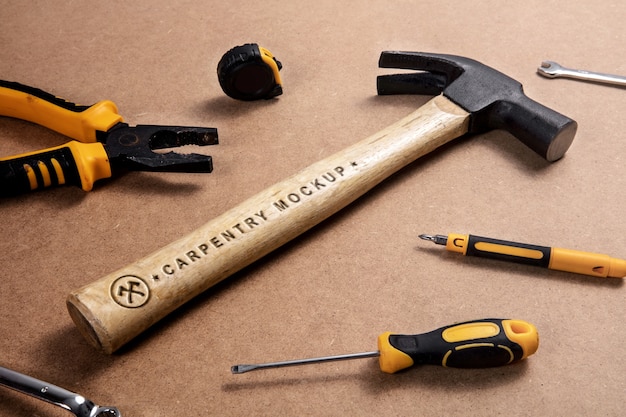 Hammer with wooden handle and engraved text effect mock-up