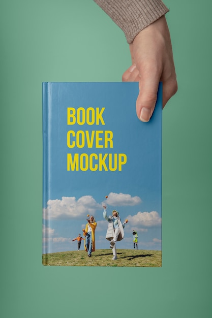 PSD hand holding  book mockup