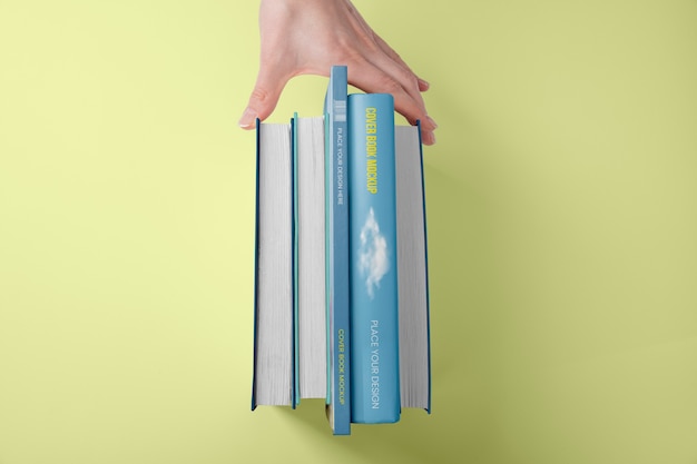 PSD hand holding  book mockup