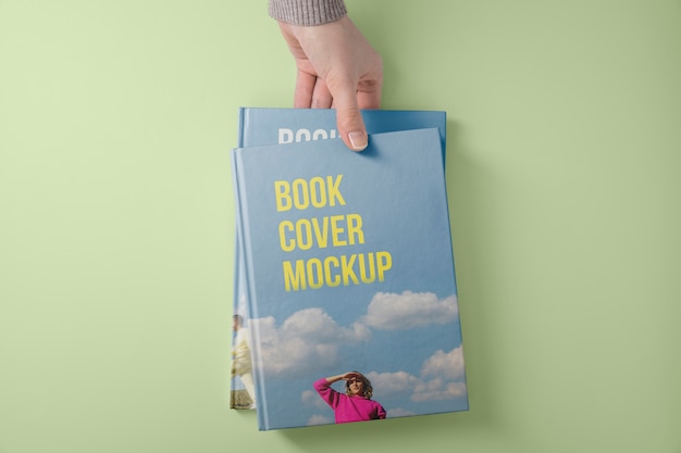 PSD hand holding  book mockup