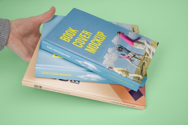 PSD hand holding  book mockup