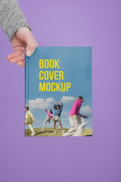 PSD hand holding  book mockup