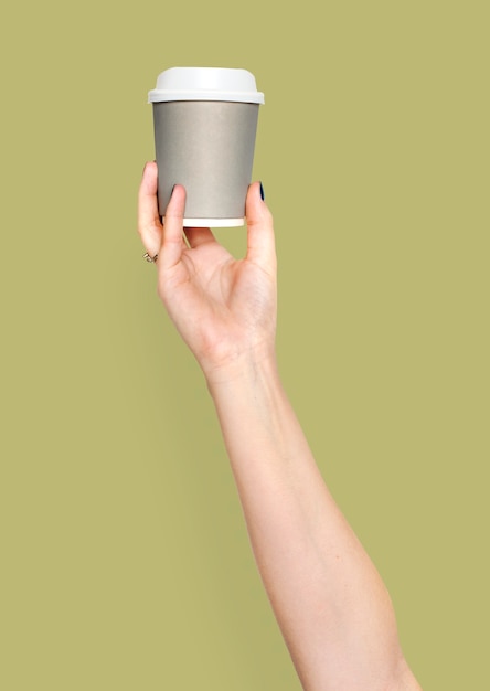 PSD hand holding cup