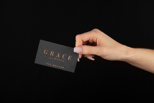 Hand holding embossed business card