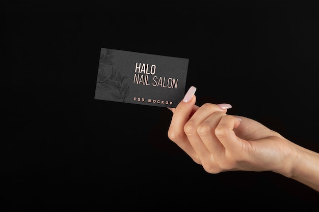 Hand holding embossed business card