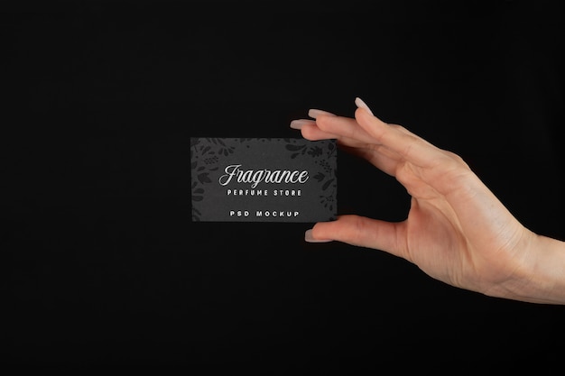 Hand holding embossed business card