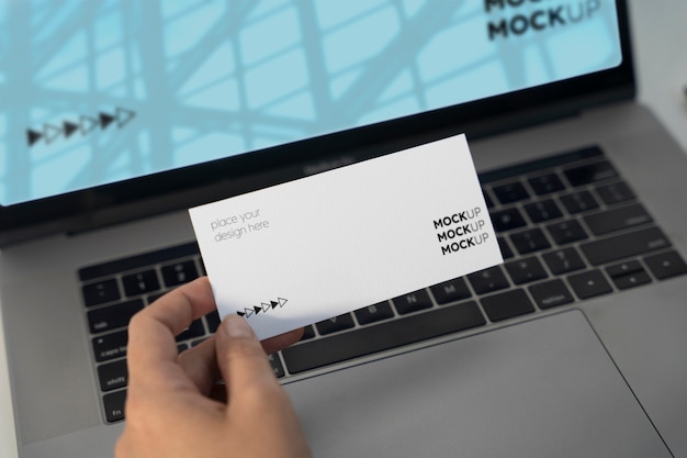 Hand holding gift card mockup