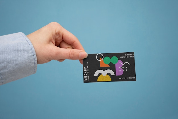 Hand holding gift card  mockup