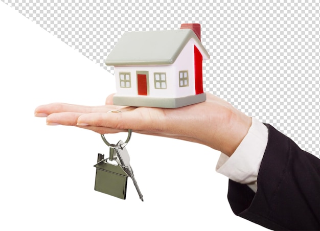 a hand holding a house with keys and keys in the background