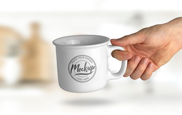 Hand Holding a Mug Mockup