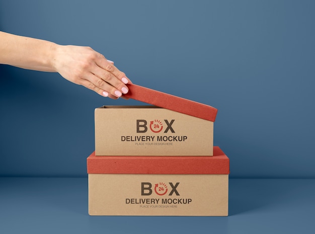 Hand opening mailing box mockup