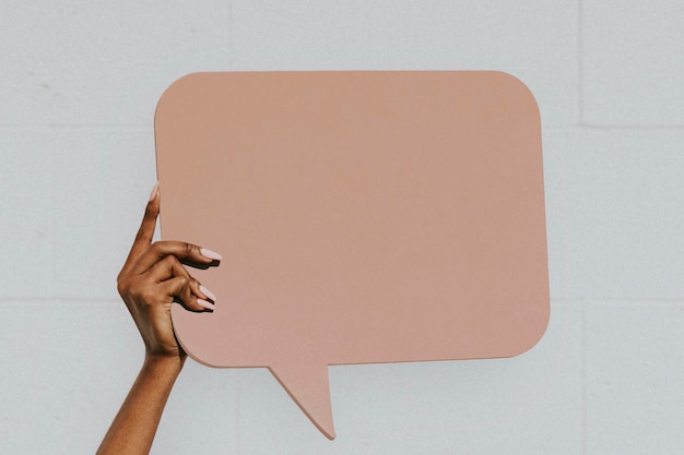 Hand showing a blank speech bubble mockup