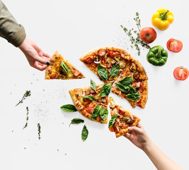 Hands taking slices of italian cuisine pizza