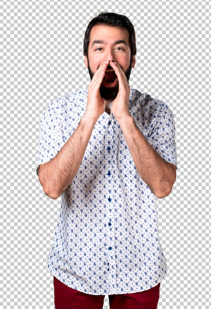 Handsome brunette man with beard shouting