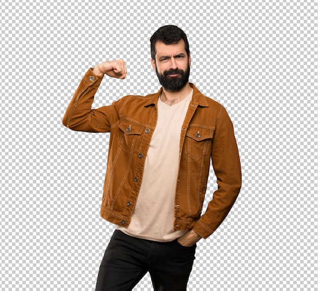 Handsome man with beard doing strong gesture