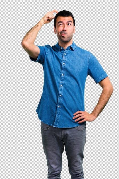 Handsome man with blue shirt having doubts and with confuse face expression